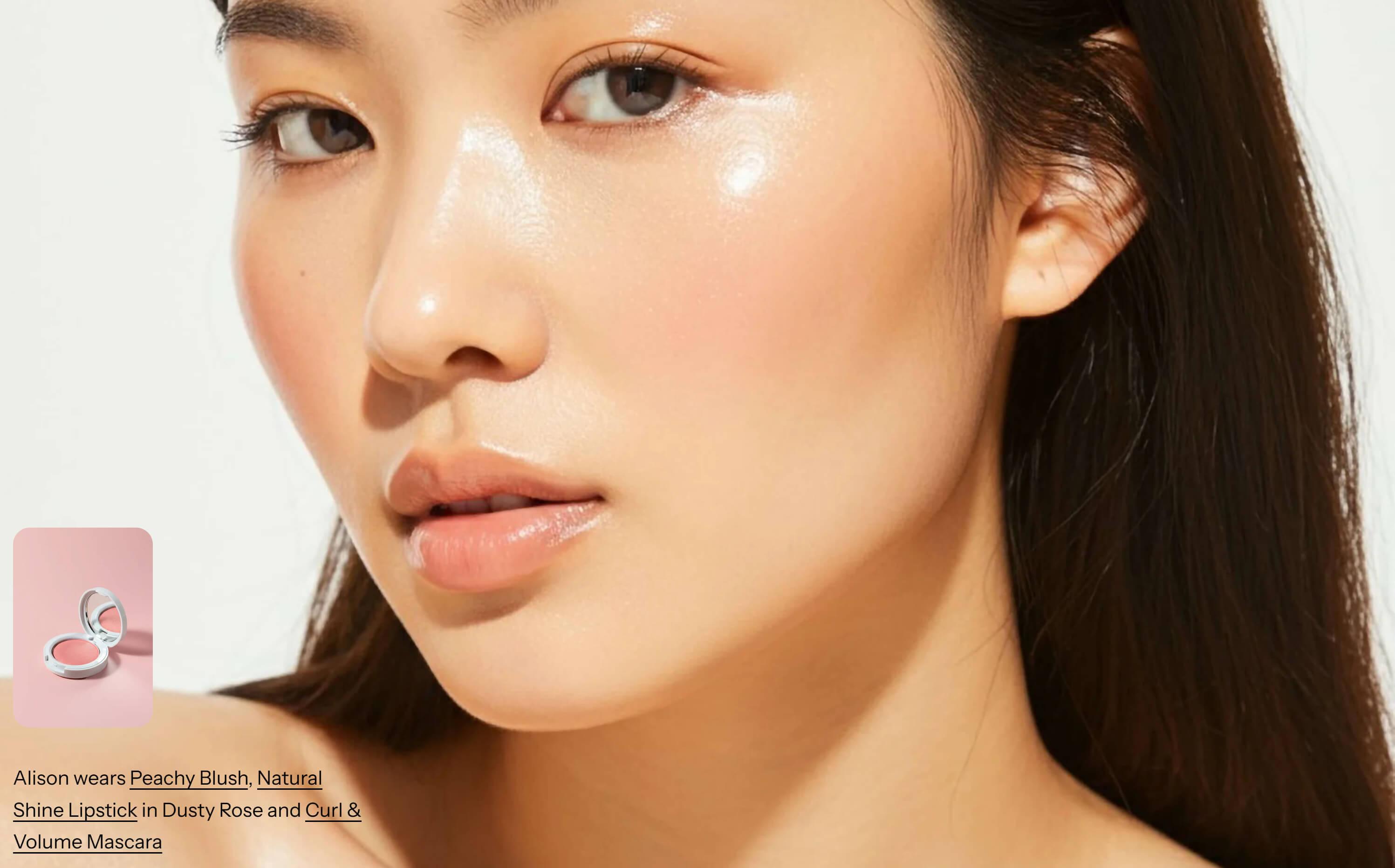 Closeup of a woman wearing makeup from the Primavera Gloss theme. The bottom left of the image has text overlaid describing the products the model is wearing, with a small product image thumbnail.